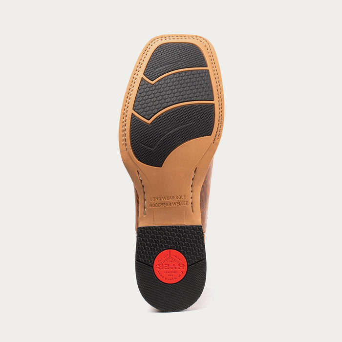 Close-up of a shoe sole with brand logo on a light gray background