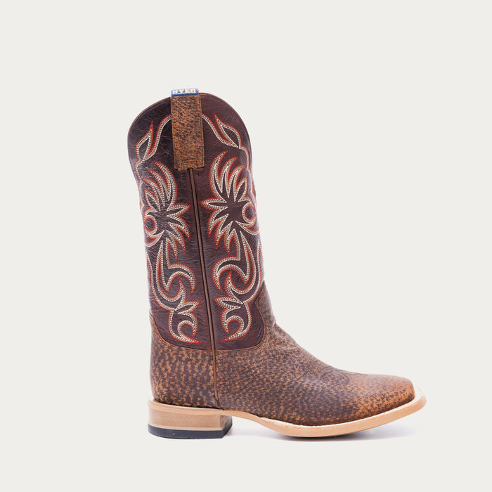 Brown cowboy boot with white and red intricate stitching on a light gray background