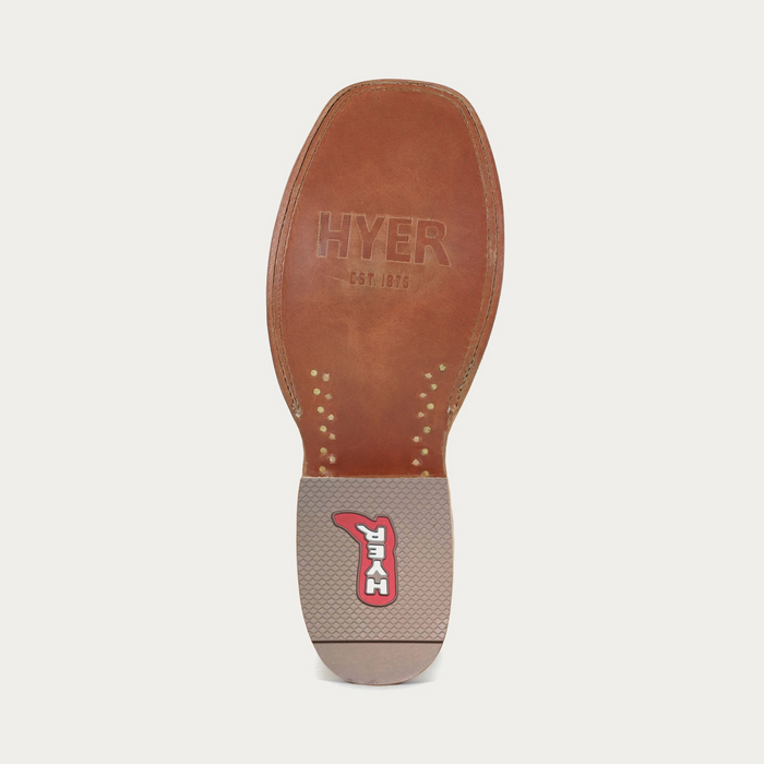 Detail shot of women's cowgirl boot leather sole with "Hyer" branded details