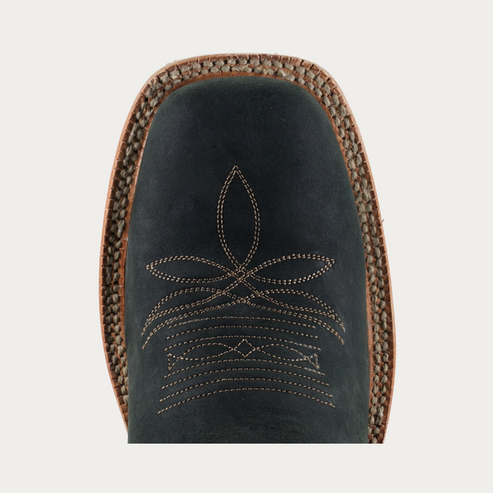Detail shot of women's black cowgirl boot square toe with beige detailed stitching