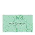 A rectangular, green marble-patterned card displays the text "FLAMINGO ESTATE."
