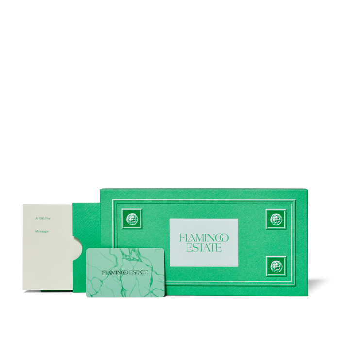 A green rectangular gift card holder features the text "FLAMINGO ESTATE."