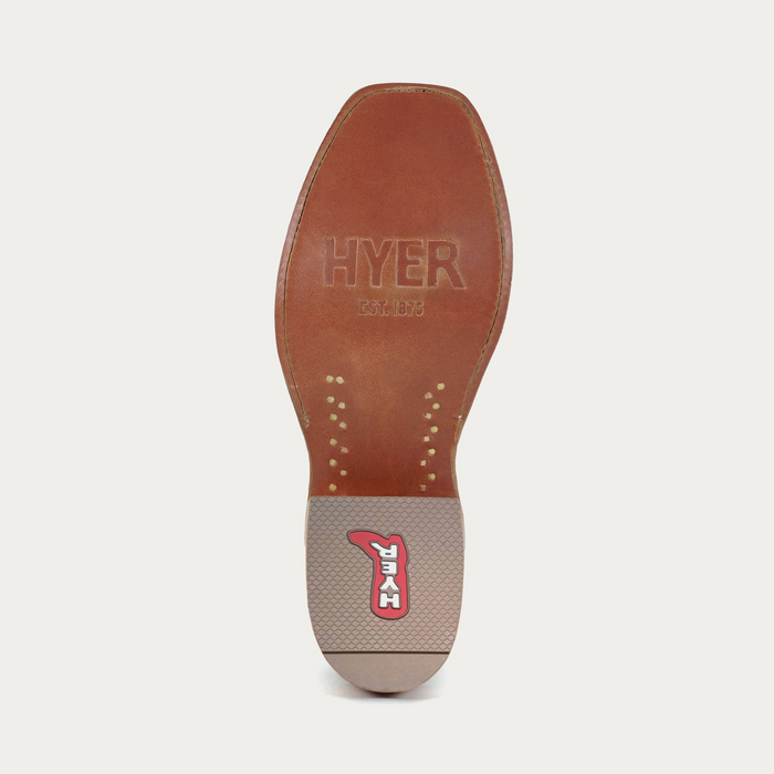 Detail image of leather sole of cowboy boot with 'Hyer' branding