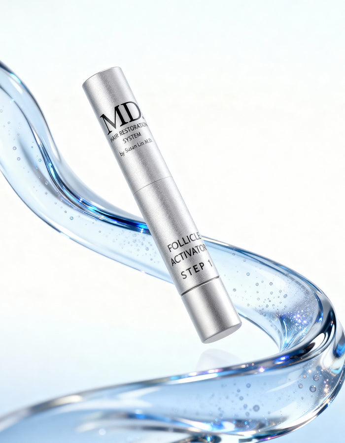 MD® Follicle Activator Step 1 scalp serum pen with a flowing water ribbon — physician-formulated for thicker-looking, stronger-looking hair.