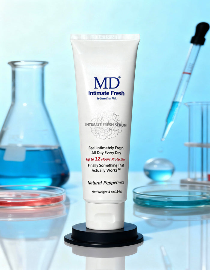 MD® Intimate Fresh leave-on serum with natural peppermint, by Dr. Susan Lin, M.D., shown in a laboratory setting.
