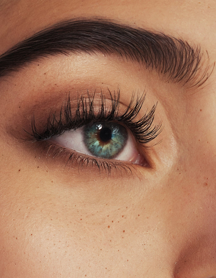 Before and after photographs from the published four-week clinical study of MD Lash Factor®, in which mean eyelash length increased 42% to 53% across active groups against 20% for placebo.