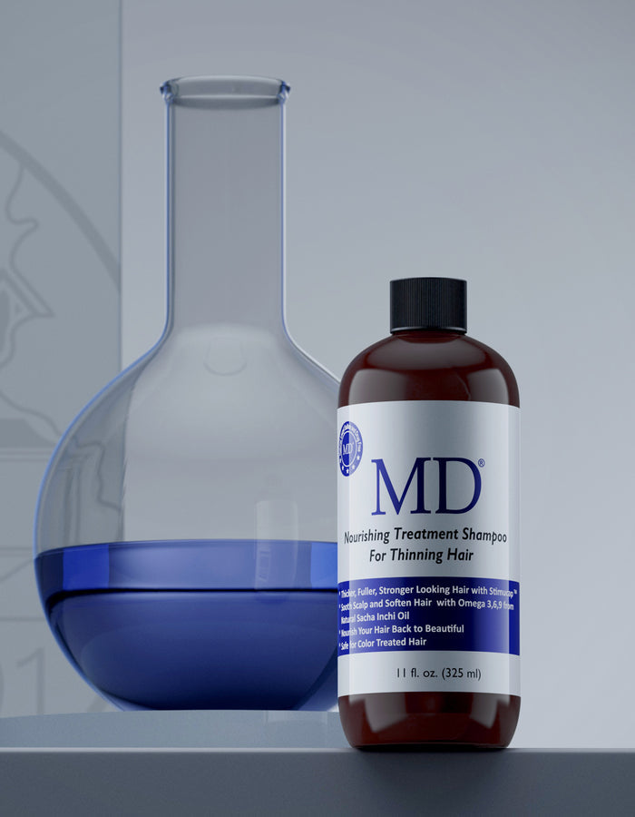 Infused with safflower, sesame oil, aloe vera, and StimuCap, MD Revitalizing Shampoo strengthens, hydrates, and revitalizes fine, fragile-looking hair.
