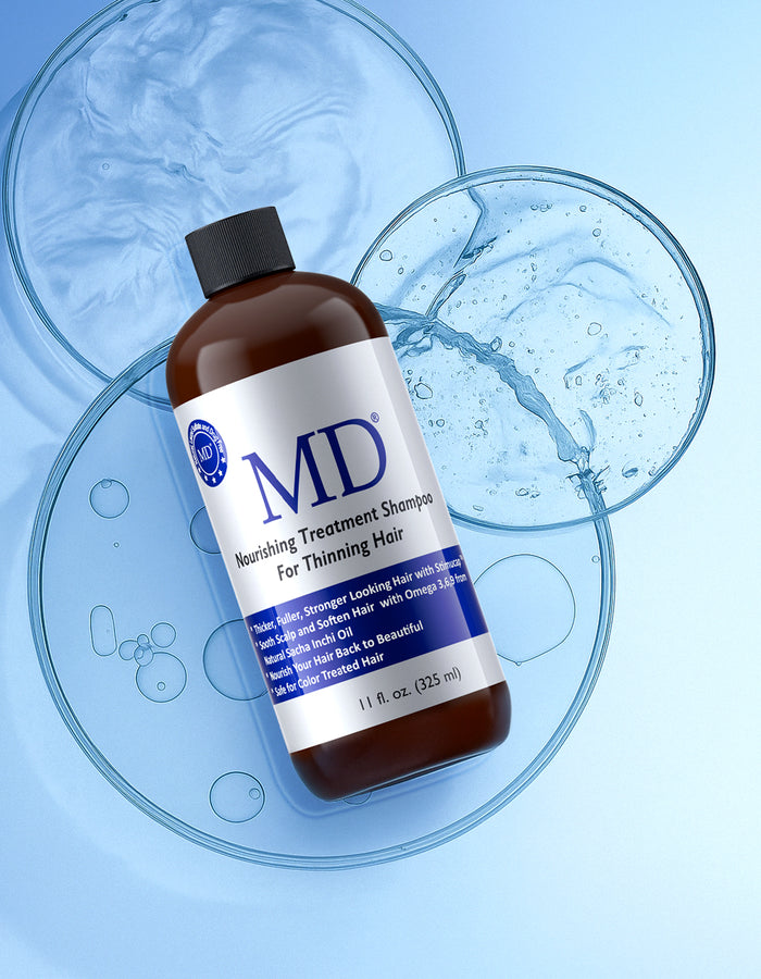 MD Revitalizing Treatment Shampoo leaves hair looking fuller and feeling softer while soothing the scalp and balancing oil, infused with essential oils for a refreshing cleanse.