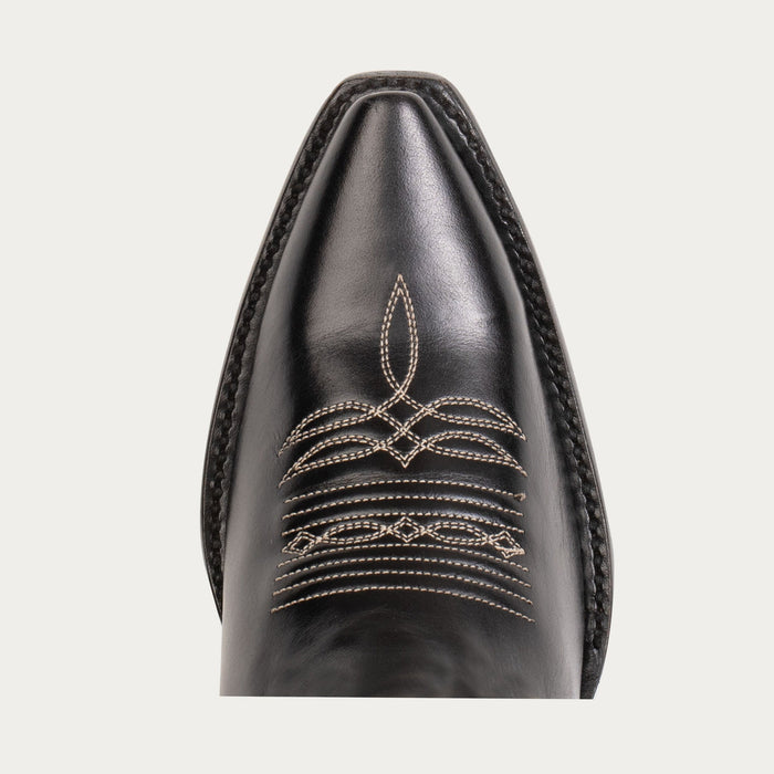 Detail shot of black cowgirl boot snip toe with detailed white stitching