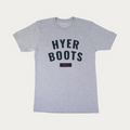 A heather gray crewneck t-shirt featuring the text 'HYER BOOTS' in dark navy blue arched lettering on the chest, with a small dark navy box below containing the year '1875' in red. The shirt is displayed flat against a light off-white background.