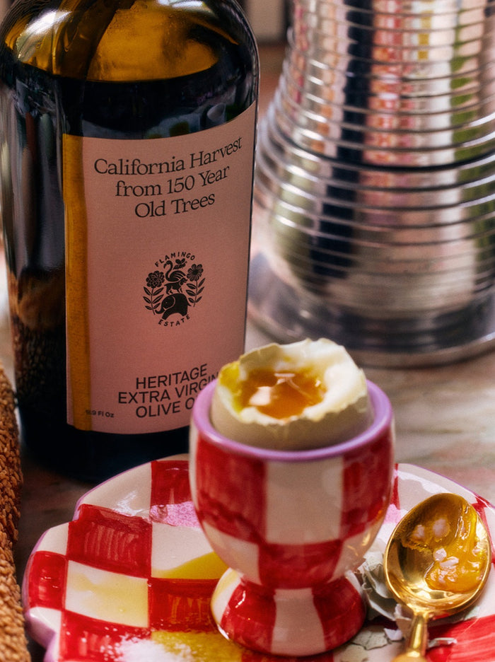 Bottle labeled "California Harvest from 150 Year Old Trees, Heritage Extra Virgin Olive Oil."