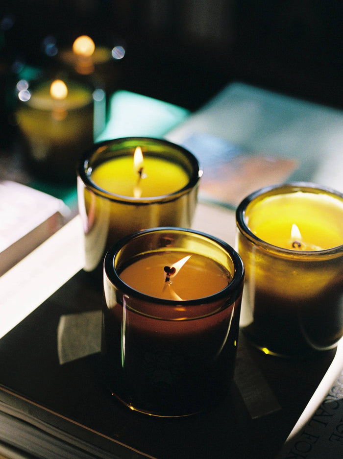 Candles flicker gently, casting warm light.
