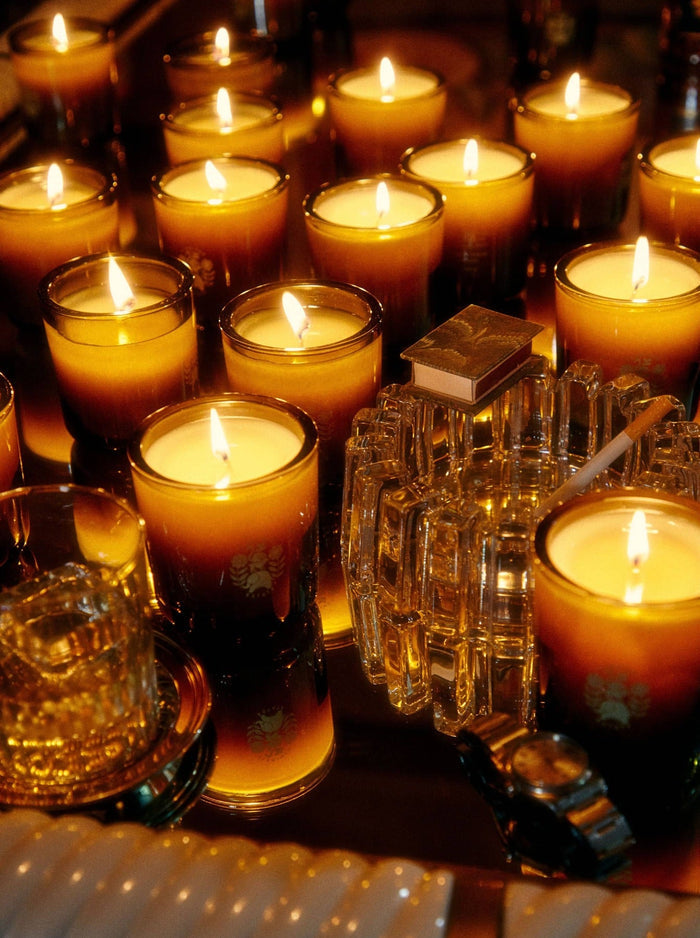 Lit candles flicker warmly, casting a soft glow.