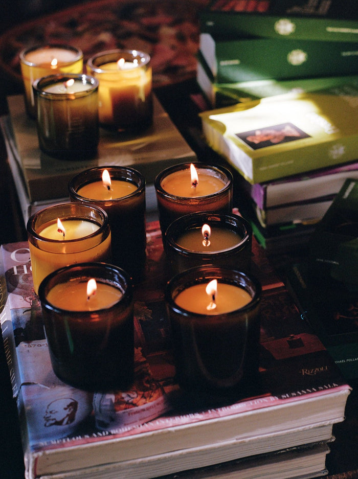 Candles burn softly, creating a warm ambiance.